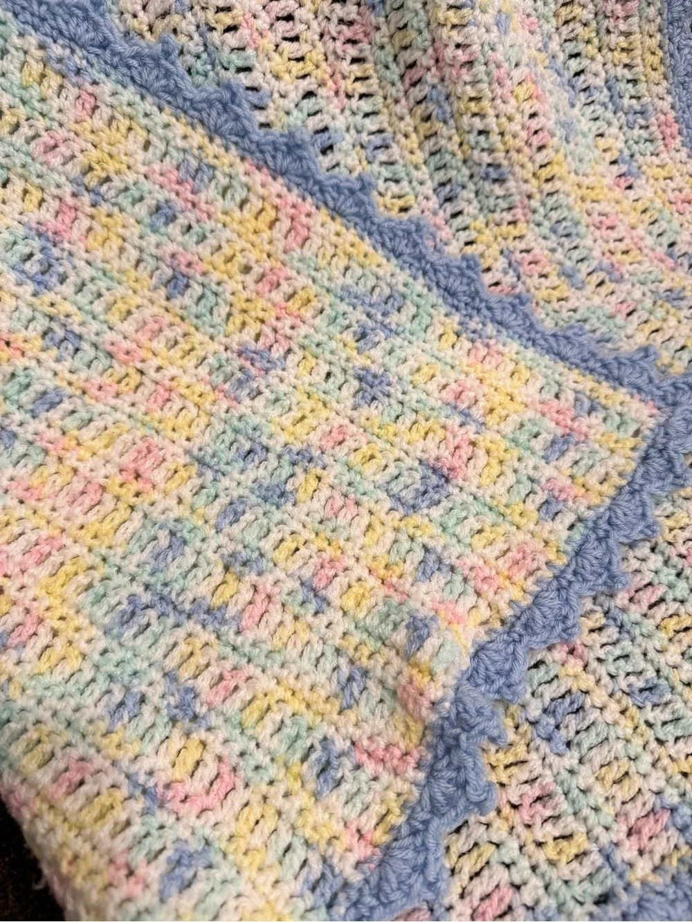 Handcrafted Pastel Multicolor Crochet Throw with Blue Edge. Nursery gift